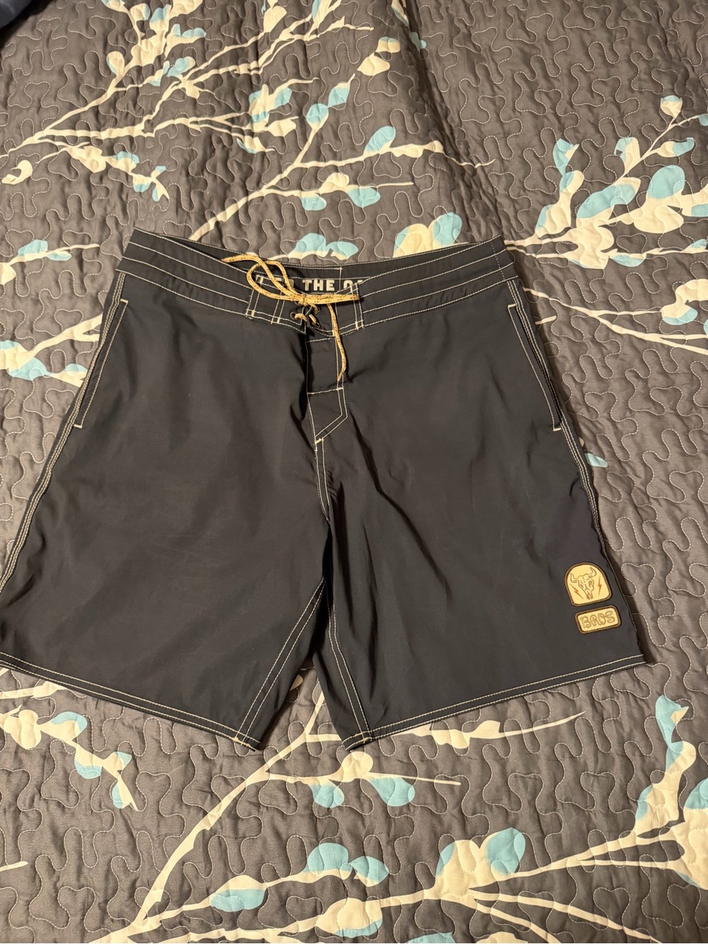 Howler Brothers Black Swim Board Shorts with Gold Accents